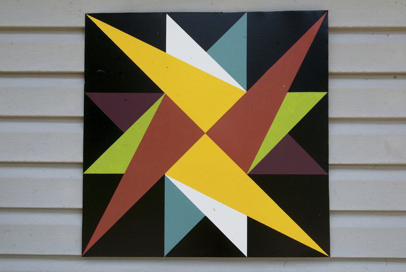 Area resident uses rural structures as backdrops for folk art